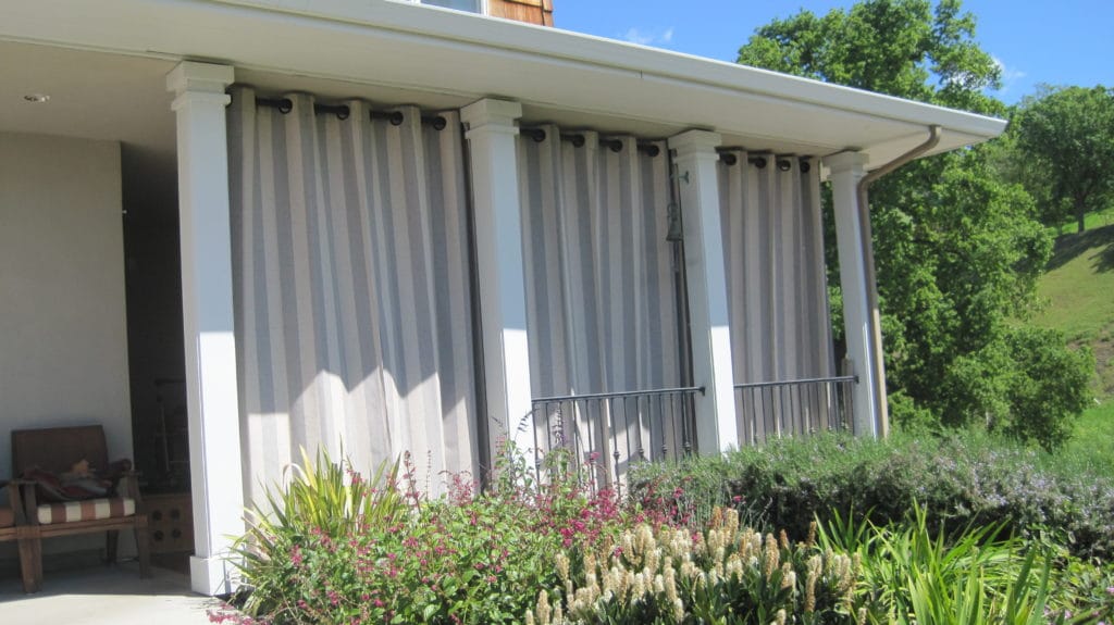 This outdoor lounging area needed protection from wind and sun in Danville