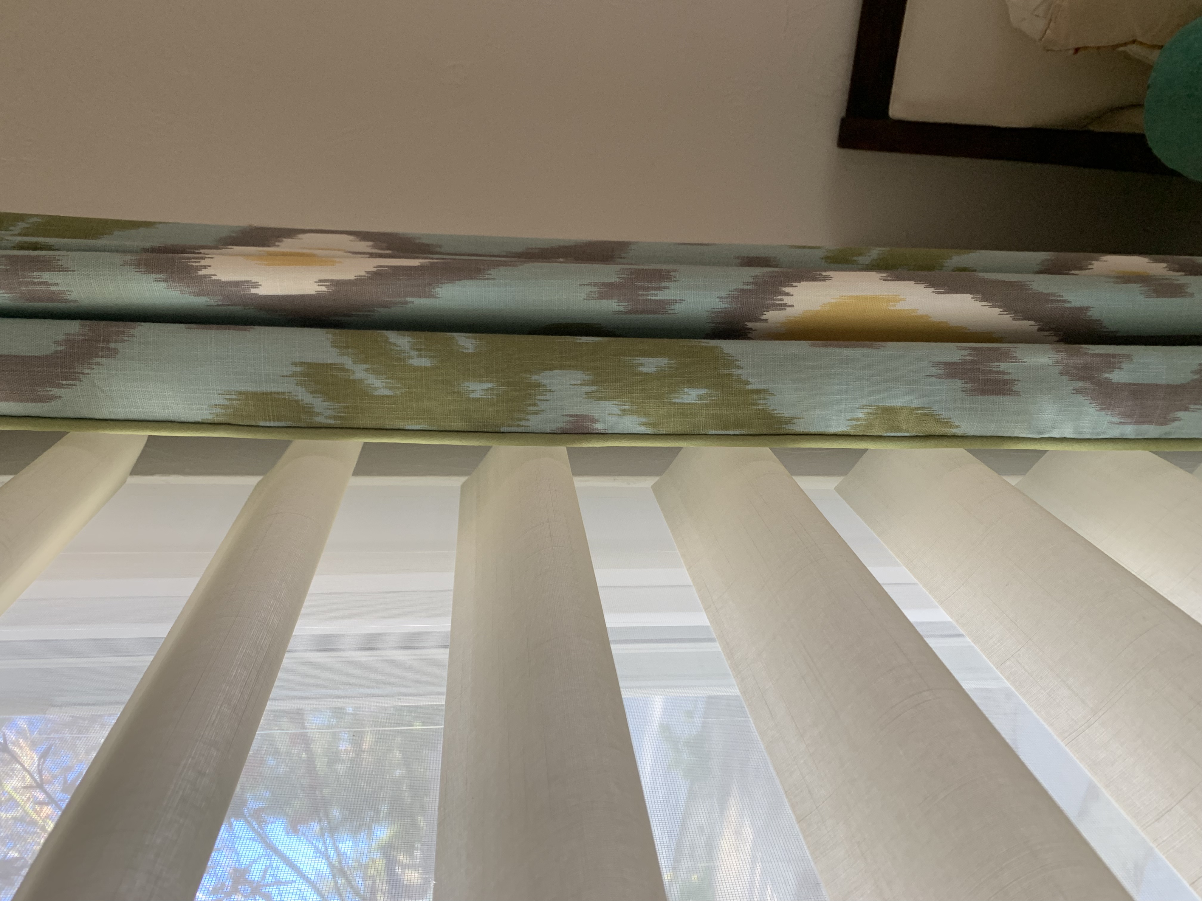 Hunter Douglas Pirouette shade with decorative drapery